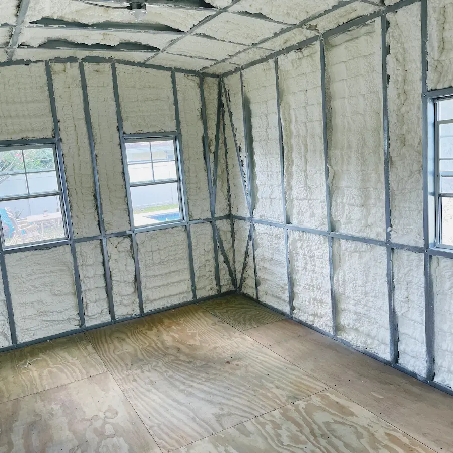 Closed-cell spray foam insulation applied to wall cavities in a residential project in Sun City Center